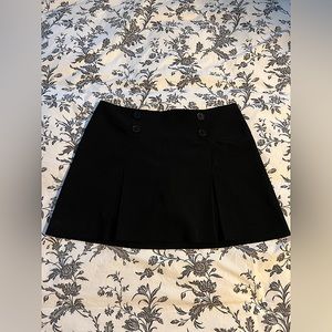 Pleated Y2K Mini Skirt with Button Details